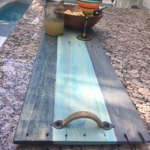 Custom charcuterie wood tray with henna wrapped handles.